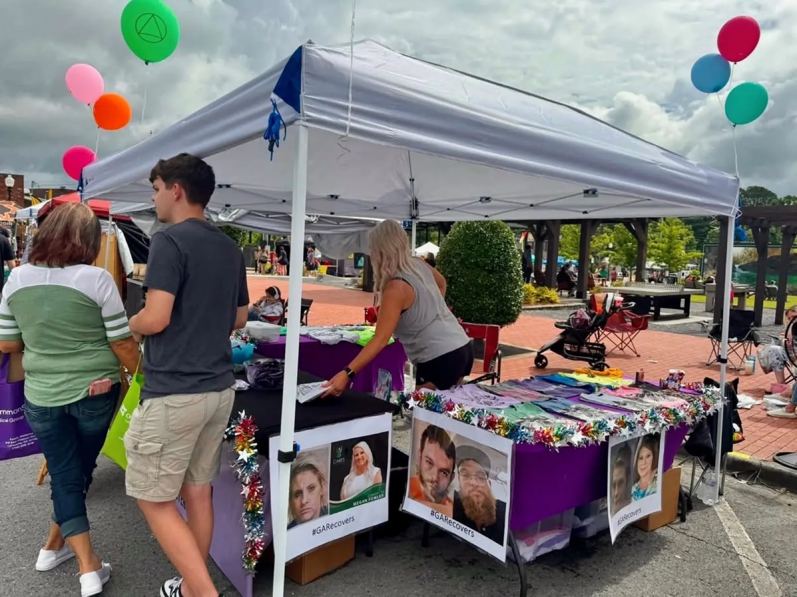 Unified in Recovery community members at a community event