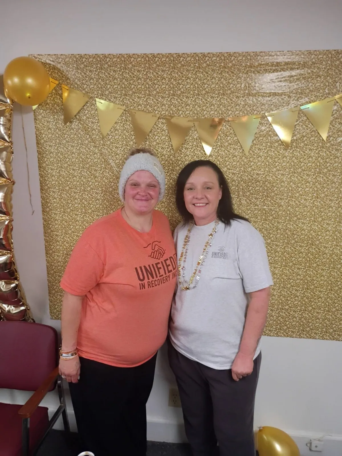 Unified in Recovery community members at a community event